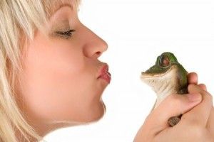 woman kissing frog