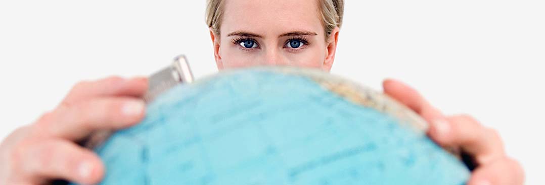 person holding globe